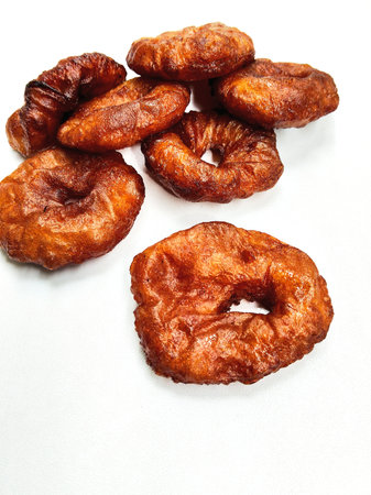A delicious pile of traditional cakes, a sweet Sundanese dessert made from rice flour and palm sugar, on a clean white background.の写真素材