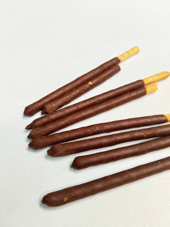 chocolate wafer stick on white background, closeup of photoの写真素材