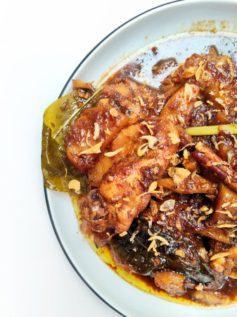 Stir-fried chicken with oyster sauce on white background.の写真素材