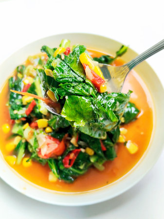 Stir Fried Spinach with Sweet and sour sauce, Thai foodの写真素材