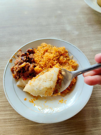 Delicious Traditional Nusantara Snack Ketan Bakar with Coconut Flakes