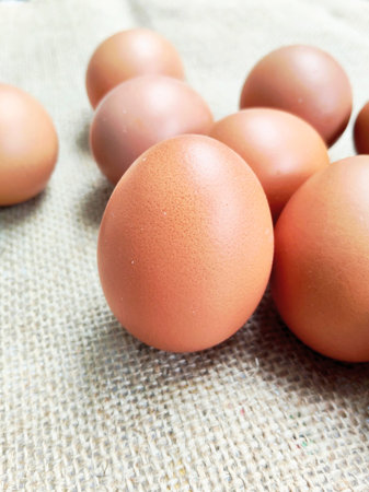 Eggs on sackcloth background, healthy food and nutrition concept