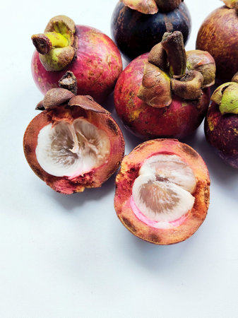Mangosteen fruit on white background, Tropical fruit, Indonesiaの写真素材