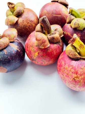 Mangosteen fruit on white background - Healthy tropical fruit.の写真素材