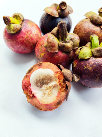Mangosteen on white background. Tropical fruit. Healthy food.の写真素材