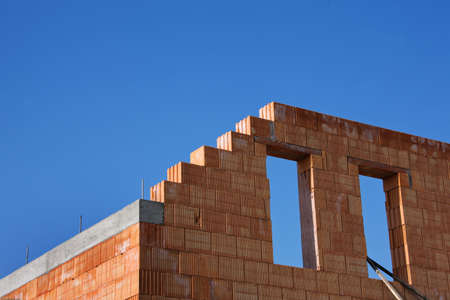 Construction of a house with bricksの写真素材