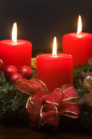 Four burning candles on the Advent wreath