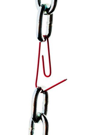 Faulty steel chain is held together a paper clip