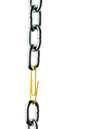 Faulty steel chain is held together a paper clip