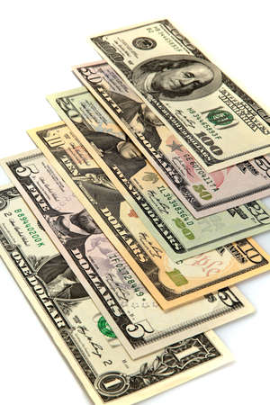 Line of US currency in different denominations. Vertically framed shot.の写真素材