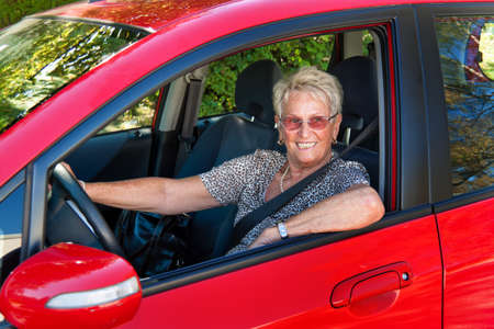 Older Woman when wearing a seat belt in a car.の写真素材