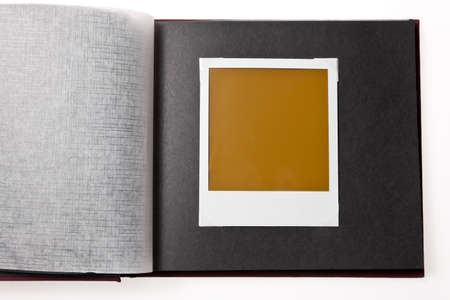Isolated empty photo in a photo album. Isolated on white backgroundの写真素材