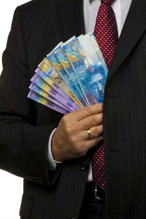 Manager, Swiss franc banknotes in his handの写真素材
