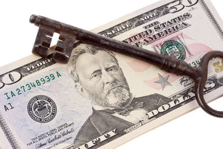 Many dollar bills and keyの写真素材