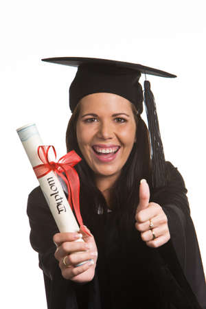 Young woman as a student after successful graduation with doctoralの写真素材