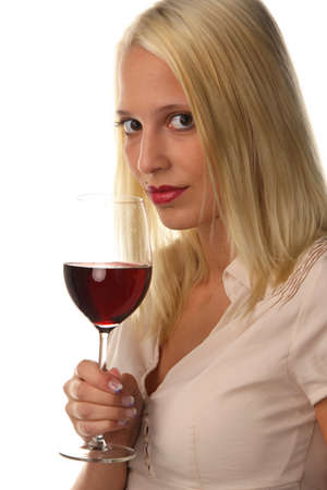 Young woman drinking wine on a white backgroundの写真素材
