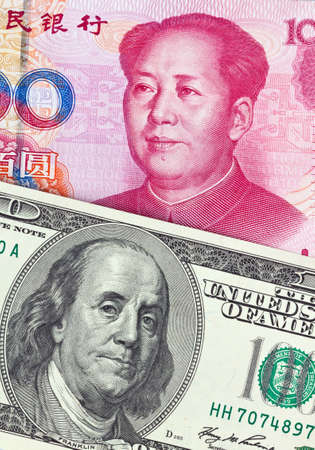 Chinese currency yuan and U.S. dollars amerkinaische billsの写真素材