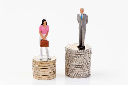 Gender differences in salaries between man and womanの写真素材