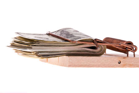 Many dollar bills in a mousetrap. Debt trapの写真素材
