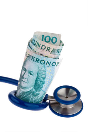 Swedish krona, the currency of Sweden. With stethoscope. Health costs.の写真素材