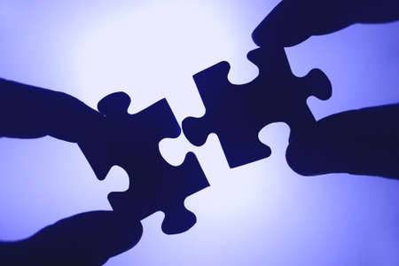 The stones are of a puzzle together. Team spirit and cooperation