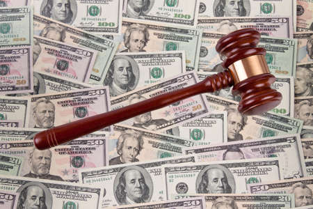 Many dollar bills with Gavel. Legal costs - legal fees.の写真素材