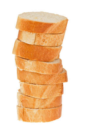 Several slices of bread from a French baguette on one another.の写真素材
