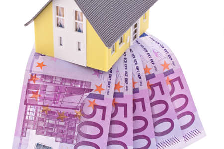 Many Euro banknotes of the European Union. Buying a house.の写真素材