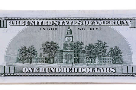 Detail of American dollar bills. Against a white backgroundの写真素材