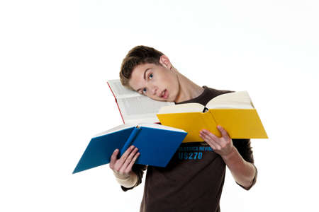 A young student in the learning with booksの写真素材