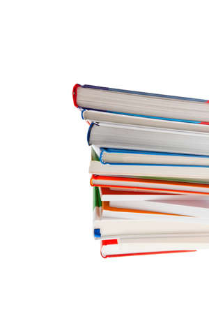 A stack of books lying on a white backgroundの写真素材