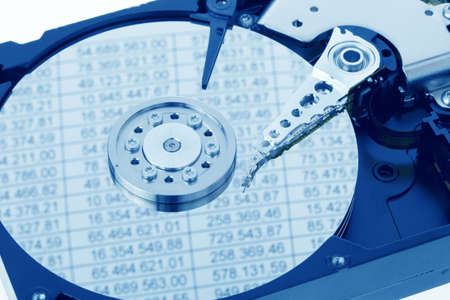 The hard disk of a computer isolated on white backgroundの写真素材