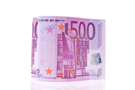 500 euro bill in the form of a heart. On white backgroundの写真素材