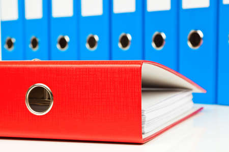 File folders with documents and papers. Retention of contracts.の写真素材