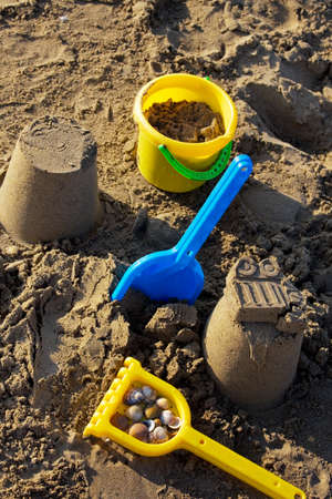 Children's toys on the beach on vacation. Memory of the holidayの写真素材