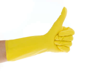 The latex glove of a cleaning lady on a white background. Thumbs up.の写真素材