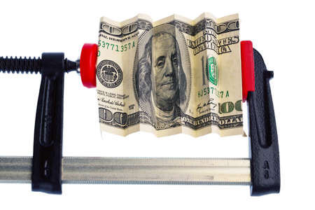 Financial or economic metaphor: dollar bill in clampの写真素材