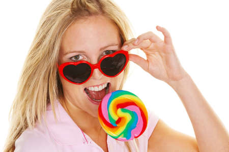 A young woman with a lollipop Schlecker says.の写真素材