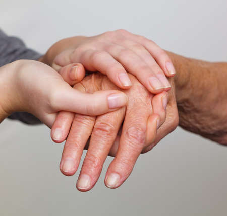 attorneys and a young hand with a cane. visit the grandchildrenの写真素材