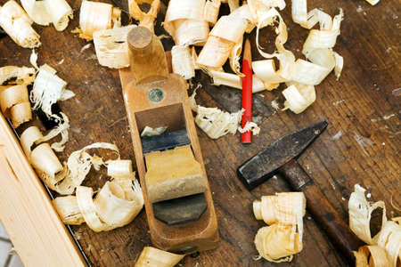 a plane in a carpentry workshop. tools in a carpenter's shop.の写真素材
