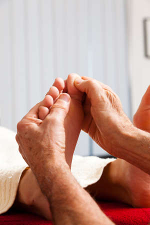relaxation, peace and well-being through massage. reflexologyの写真素材