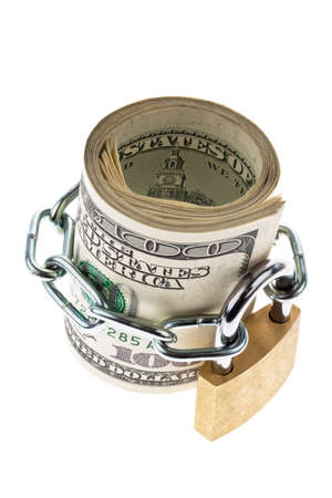 many dollar bills are locked with a lockの写真素材