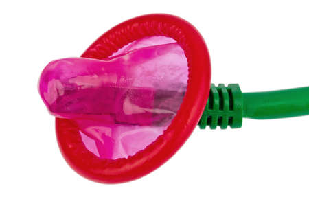a network cable and a condom on a white background. privacy and data security.の写真素材