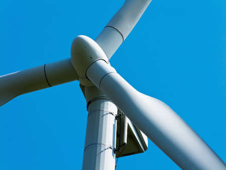 wind power alternative energy through windmill with blue hmmelの写真素材