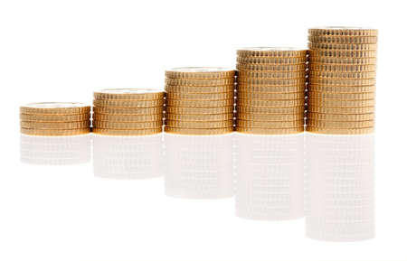 some stacks of coins on white background の写真素材