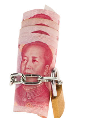 a chinese yuan bank note closed with a lock  security of investmentの写真素材