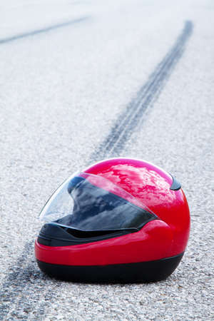 an accident with a motorcycle  traffic accidents with skid marks on road  の写真素材