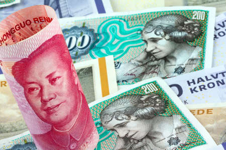 danish kroner  currency of denmark in europe  and chinese yuanの写真素材