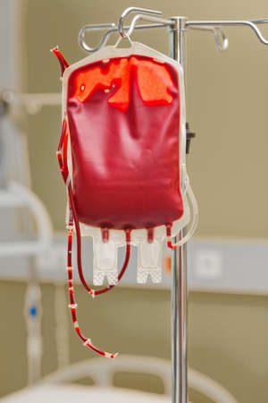 a blood bag for infusion into a clinic  donor blood is administered の写真素材