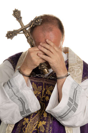 icon image abuse in the church  priest with handcuffsの写真素材